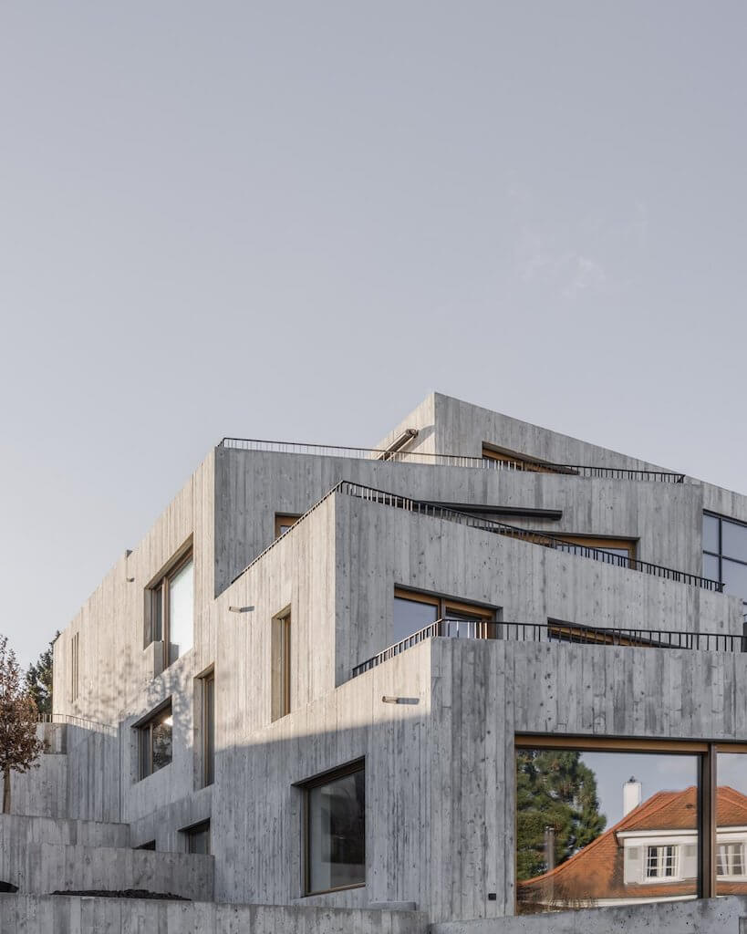 KohlerStraumann designs a concrete apartment building that seems monolithic and elegant at the