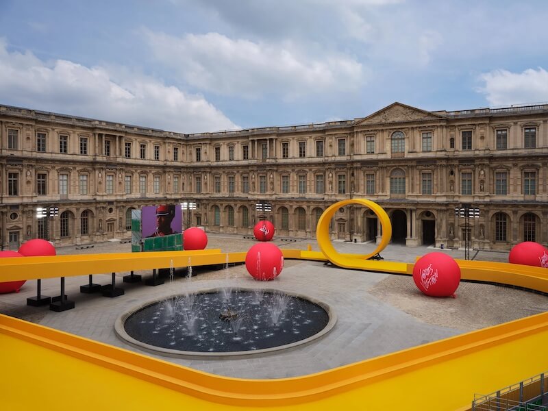 PlayLab installs a magnificent bright yellow toy racetrack in Louvre's ...